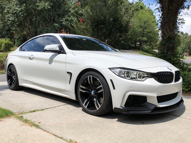 Gloss Black Performance Front Lip for BMW F32, F33, F36 models.