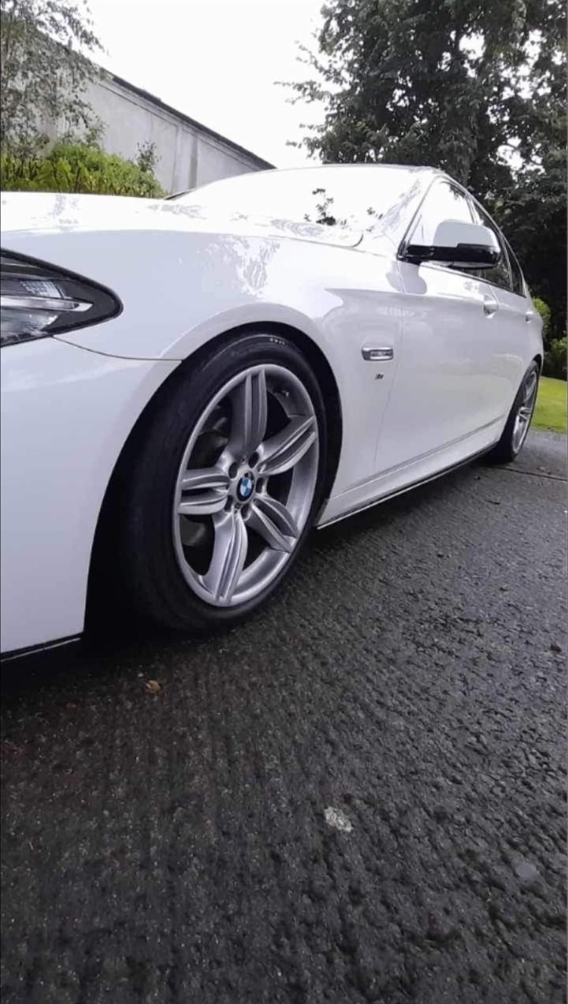 Gloss Black Performance Side skirt extension spoilers for BMW F10, F11 models.