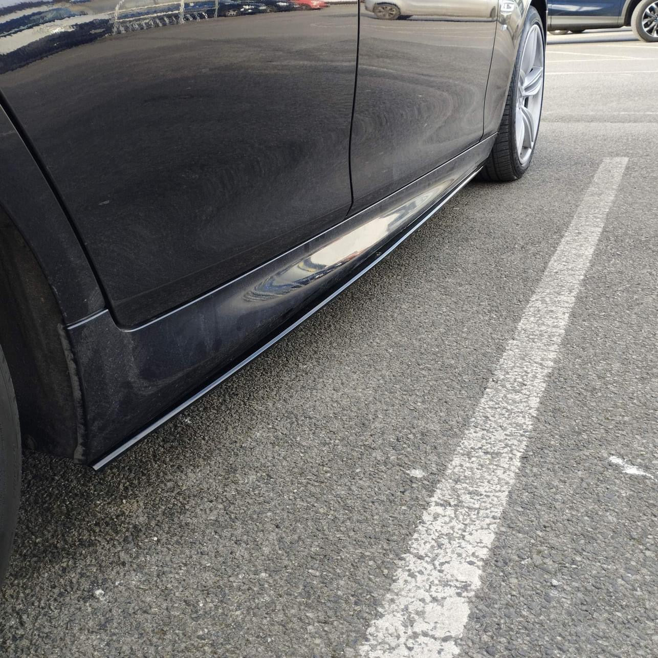 Gloss Black Performance Side skirt extension spoilers for BMW F10, F11 models.